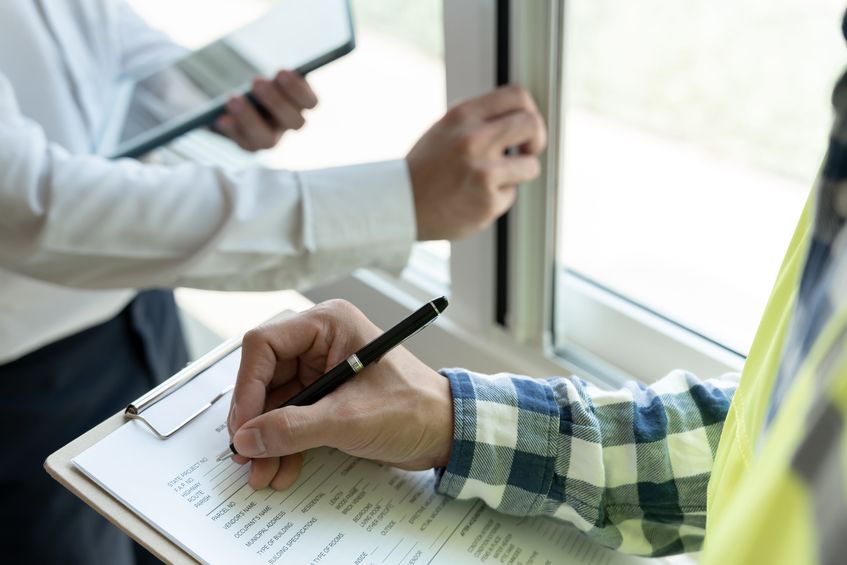 Home inspector inspecting a home before it goes up for sale